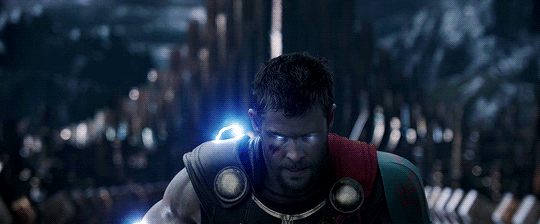 Thor glowing with blue electricity